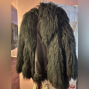 It's a Tibetan lamb 3/4 coat practically brand new.